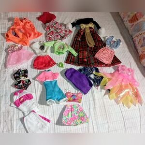 Lot of Barbie Brand Vintage doll clothes.